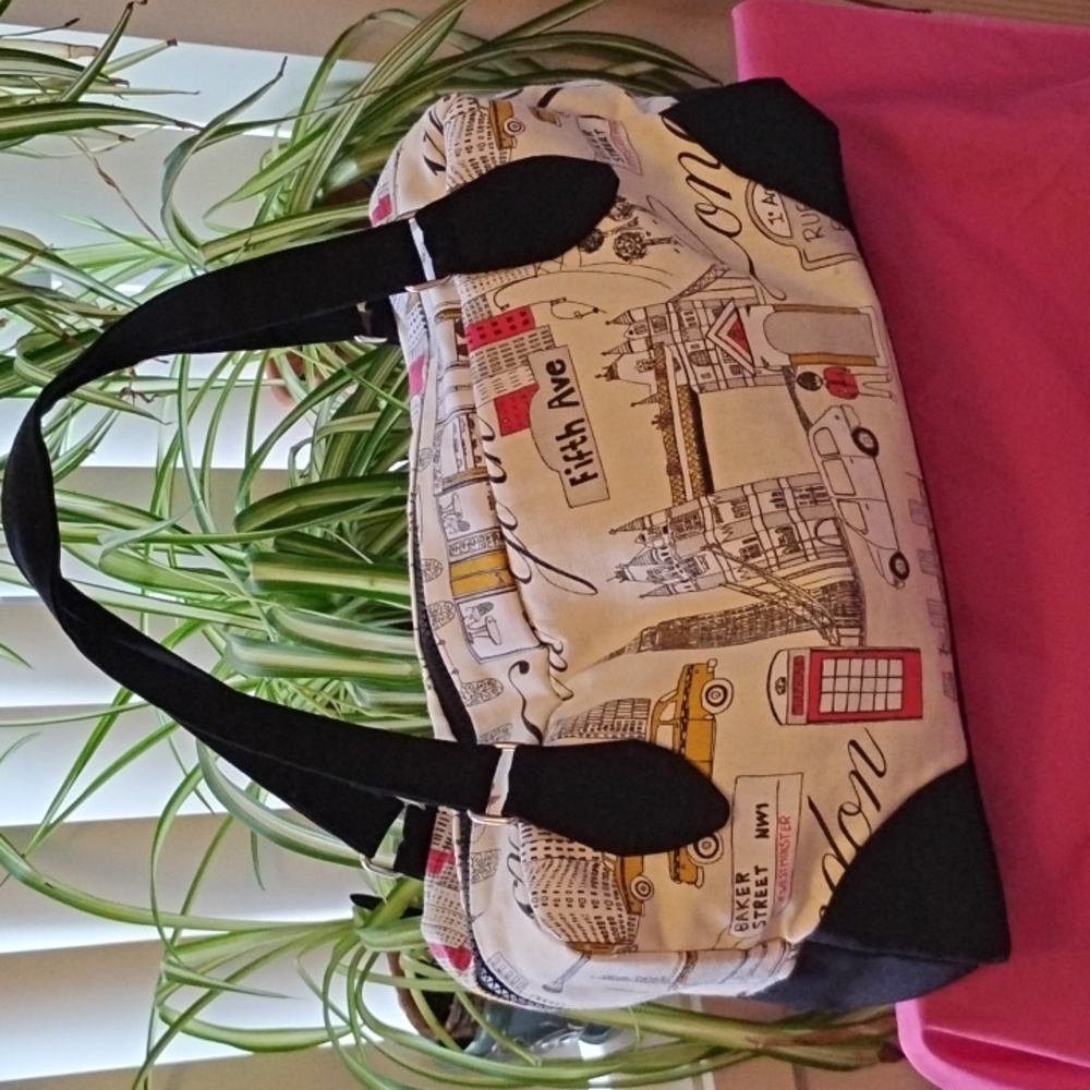 Chic London Calling Cityscape Women's Barrel Bag - Black and Cream.